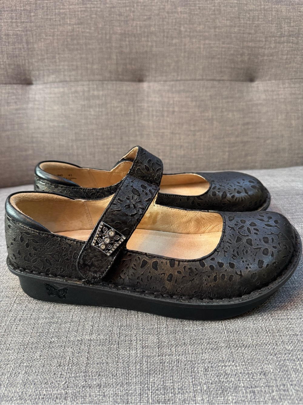 Alegria Black Floral Cutout Mary Jane Moccasins with Rhinestone Strap
